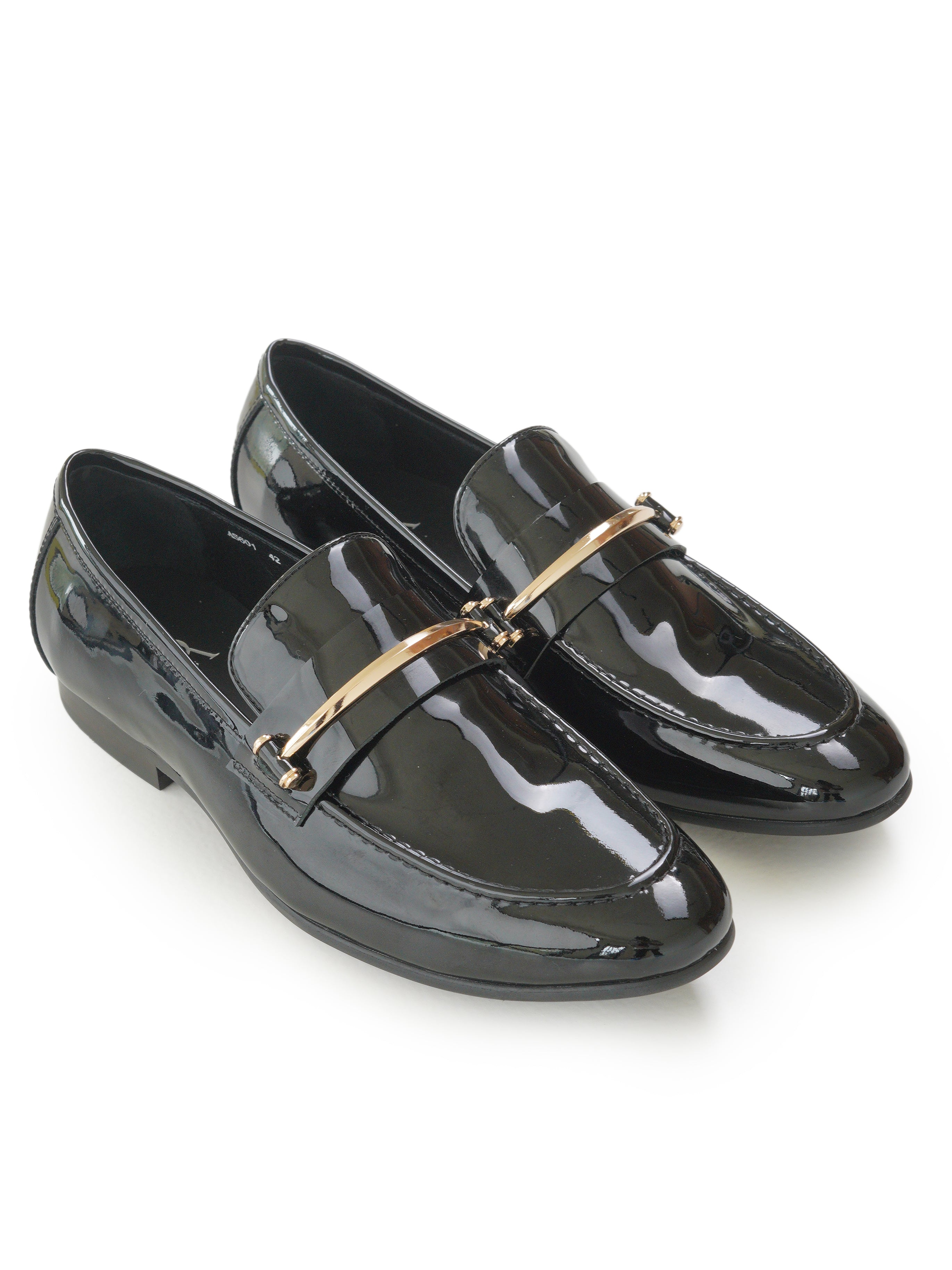 Patent mocassins with gold hardware