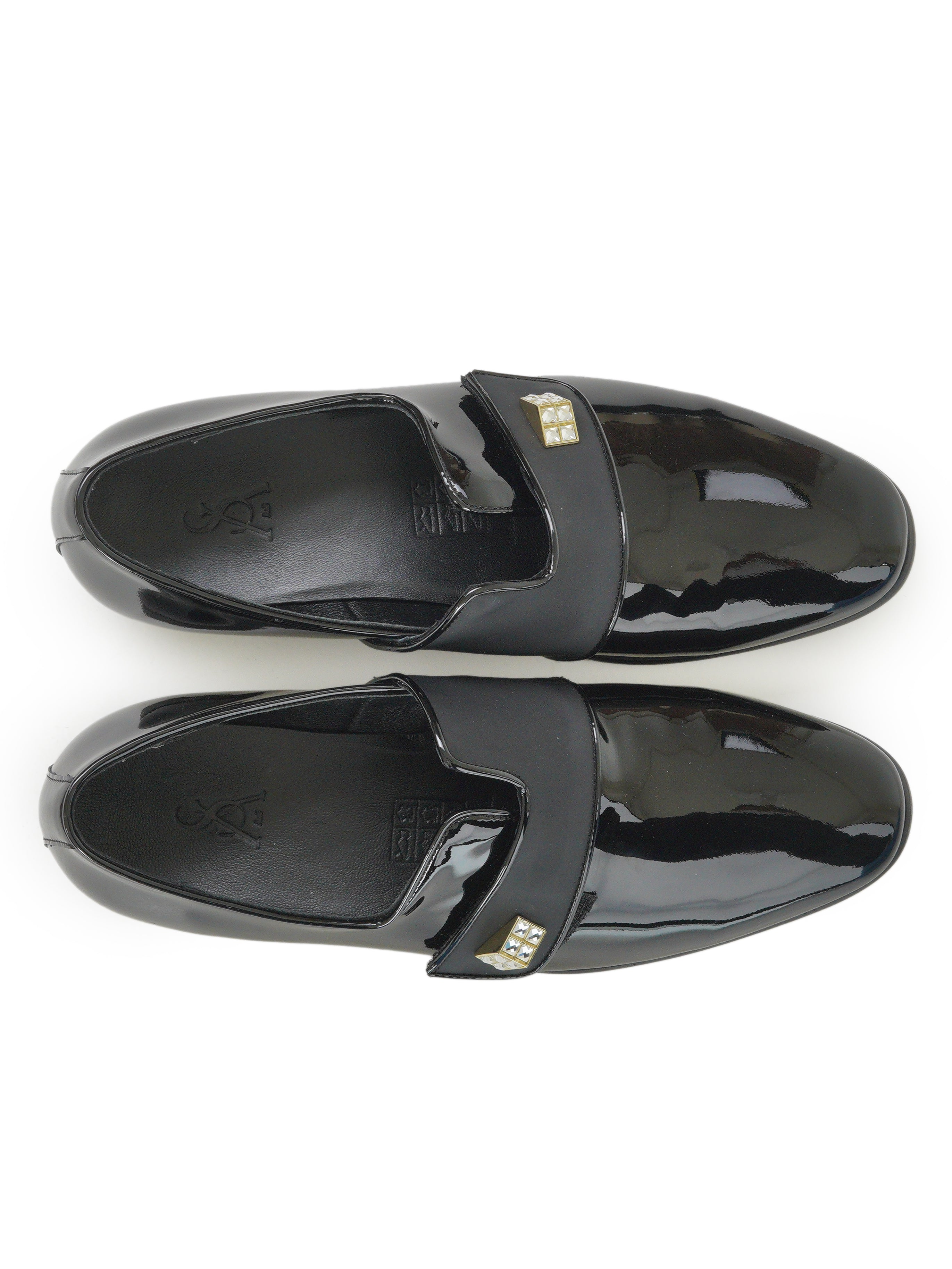 Patent mocassins with gold detailing