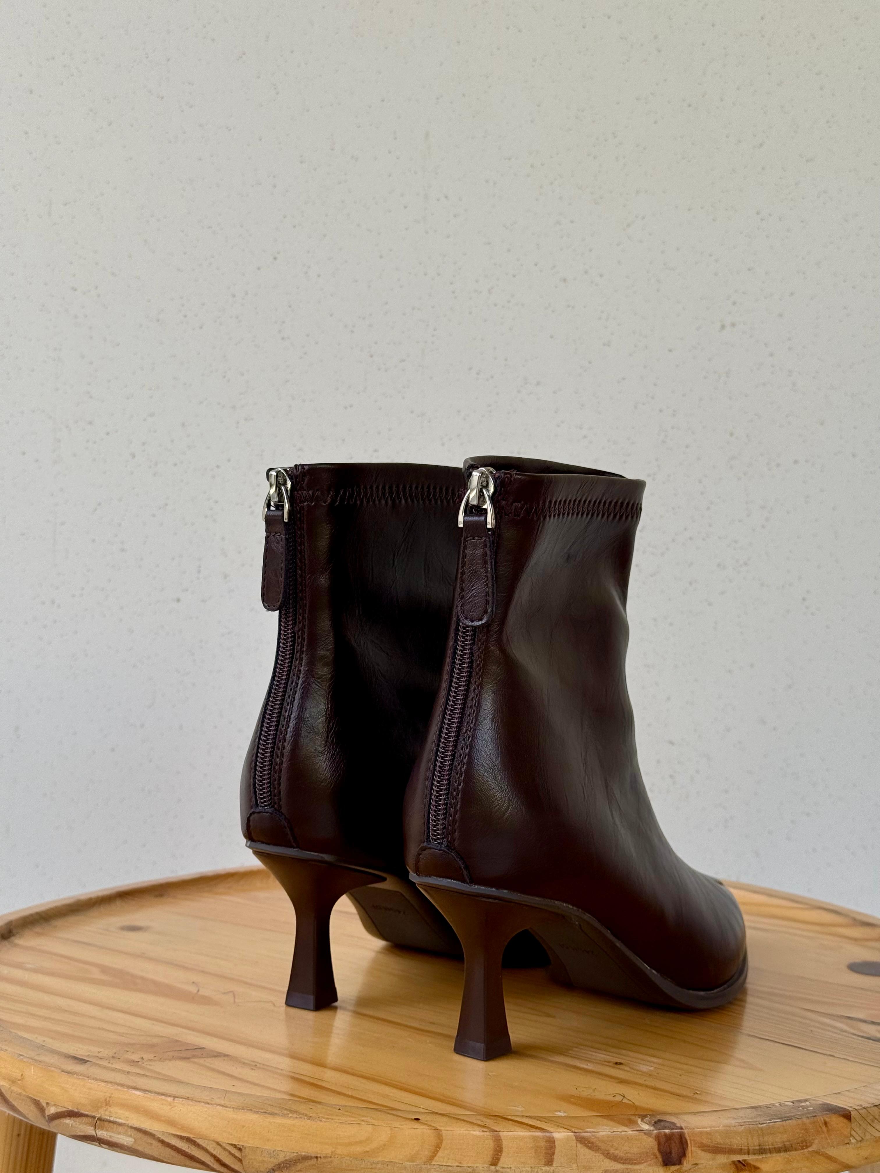 Pointed metal detail ankle boots